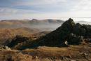 06-2271 The summit cairn of Red Screes with the Kentmere Fells behind. Lake District, Cumbria